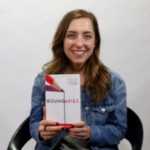 Mercy graduate Catherine Comes with her favorite book, "Boundaries" by Henry Cloud and John Townsend