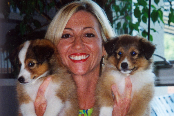 Nancy Alcorn with Sheltie puppies Jonah and Jude